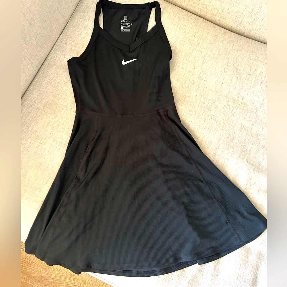 New with tags, Nike slim fit tennis A shape dress sporty dress.